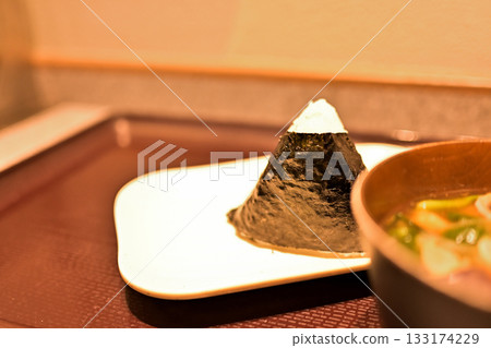 A classic Japanese dish: a simple set meal of rice balls and miso soup A classic Japanese dish: a simple set meal of rice balls and miso soup 133174229