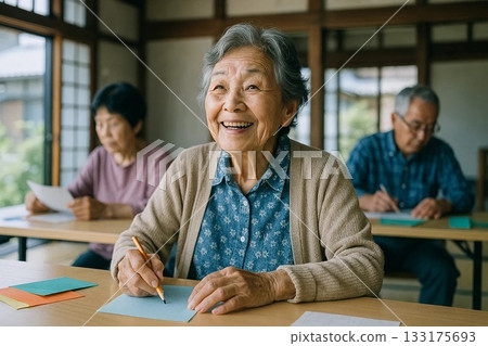 Smiling elderly woman enjoying learning at a local group Smiling elderly woman enjoying learning at a local group 133175693