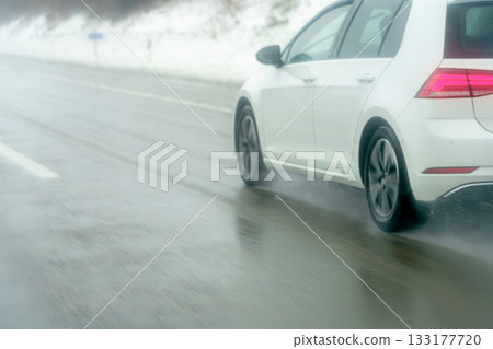 car on road in winter car on road in winter 133177720