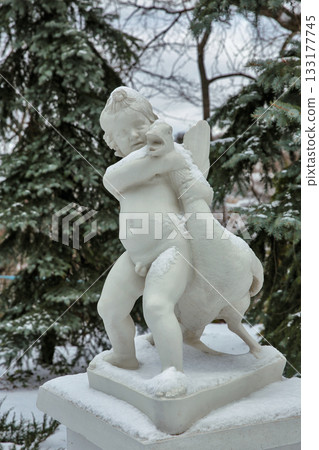 Winter statue of child with goose Winter statue of child with goose 133177745