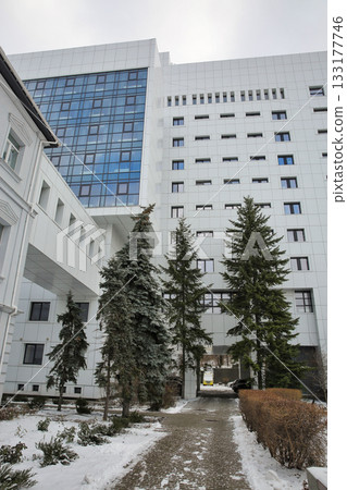 Modern hospital building in winter. 133177746
