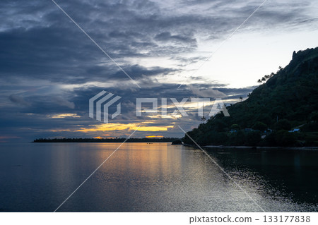 Sunset over the tranquil lagoon of Maupiti, French Polynesia 133177838