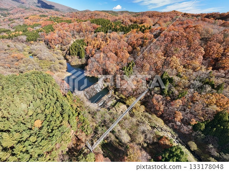 Aerial view of Yamabiko Suspension Bridge in autumn Aerial view of Yamabiko Suspension Bridge in autumn 133178048