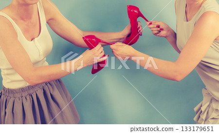 Women having argue high heels shoes 133179651