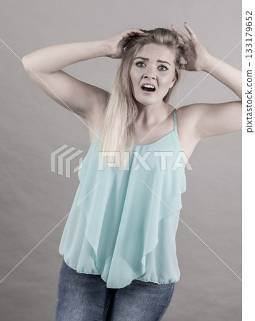 Emotional scared woman Emotional scared woman 133179652