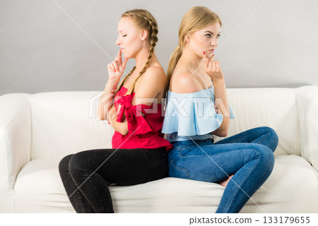 Two women being mad at each other Two women being mad at each other 133179655