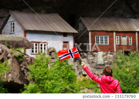 Tourist visiting Helleren houses in Jossingfjord, Norway 133179760