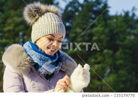 Female wearing warm outfit during winter 133179770