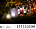 Glowing Memorial Candles in Red and White Creating a Peaceful Night Atmosphere 133180396