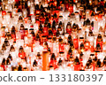 Glowing Memorial Candles in Red and White Creating a Peaceful Night Atmosphere 133180397