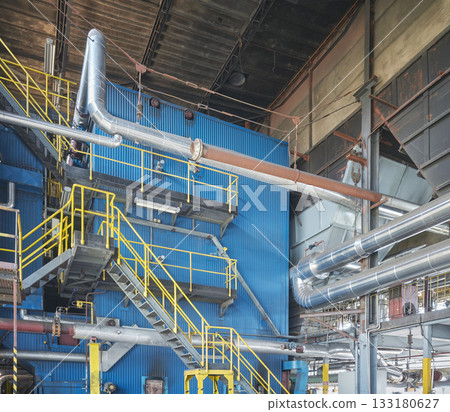 Interior of an old coal fired heating plant. Interior of an old coal fired heating plant. 133180627