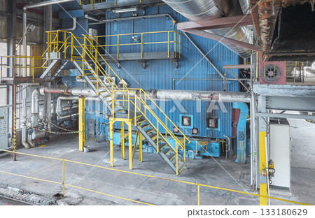 Interior of an old coal fired heating plant. Interior of an old coal fired heating plant. 133180629