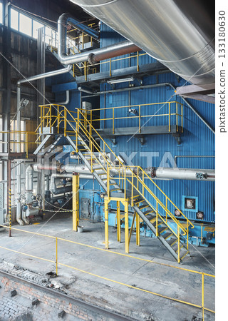 Interior of an old coal fired heating plant. 133180630