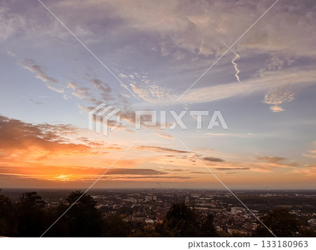 The sky is a beautiful mix of blue and orange hues The sky is a beautiful mix of blue and orange hues 133180963