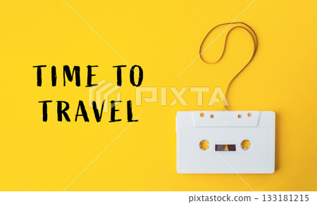 White cassette tape is hanging from a string White cassette tape is hanging from a string 133181215