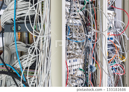 server room rack with tangled network cables creating messy unti server room rack with tangled network cables creating messy unti 133181686