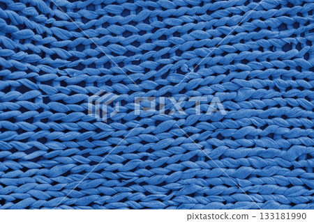 Closeup, macro blue knitted fabric, cloth texture background with thick yarn pattern surface 133181990
