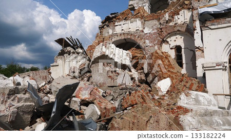 View to destroyed church at Kharkivska oblast. Ruined building after bomb attacks on ukrainian territory from russia army. Consequences of russian invasion of Ukraine. Slow motion View to destroyed church at Kharkivska oblast. Ruined building after bomb attacks on ukrainian territory from russia army. Consequences of russian invasion of Ukraine. Slow motion 133182224