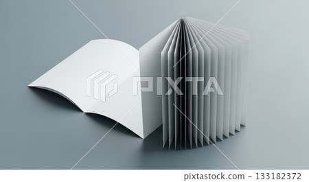 Open book with curved pages on minimalist grey background 133182372