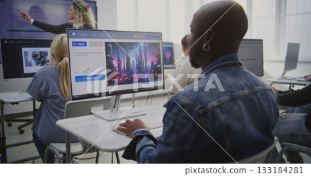 Focused Man Creating Futuristic City Image With AI Software in Modern Classroom Focused Man Creating Futuristic City Image With AI Software in Modern Classroom 133184281