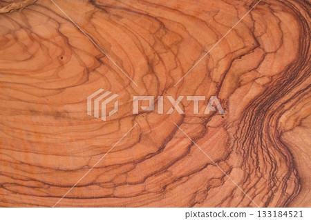 Acacia cut is used for making cutting boards or decorating interior details, acacia slab with a beautiful wood texture pattern treated with oil Acacia cut is used for making cutting boards or decorating interior details, acacia slab with a beautiful wood texture pattern treated with oil 133184521