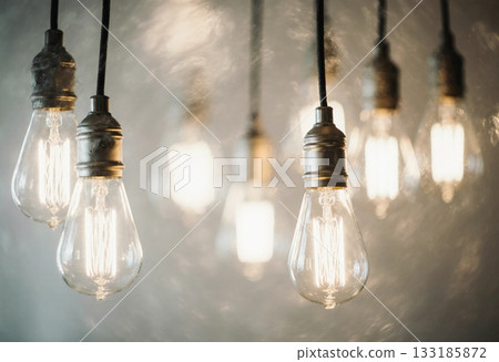 String lights hang from the ceiling, glowing warmly in a soft indoor setting. The scene captures a peaceful mood perfect for gathering or unwinding in the evening Generative AI 133185872