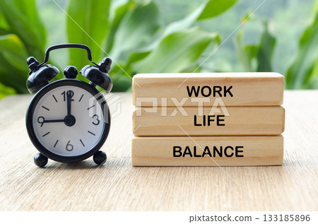 Work life balance text on wooden blocks. Working life balance concept. Work life balance text on wooden blocks. Working life balance concept. 133185896