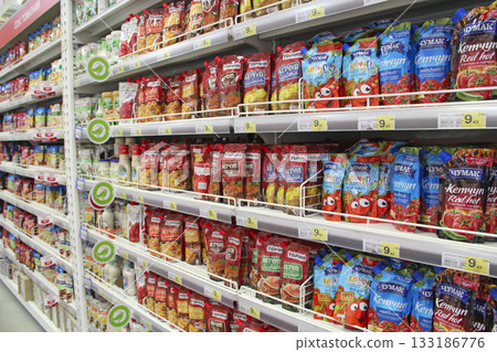 Wide assortment of ketchup on supermarket shelves Wide assortment of ketchup on supermarket shelves 133186776