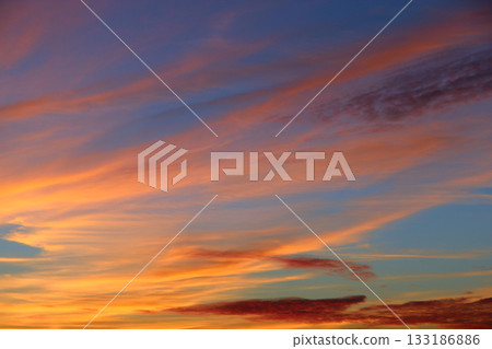 Orange sunset before night. Twilight with bright sunset. Evening landscape 133186886