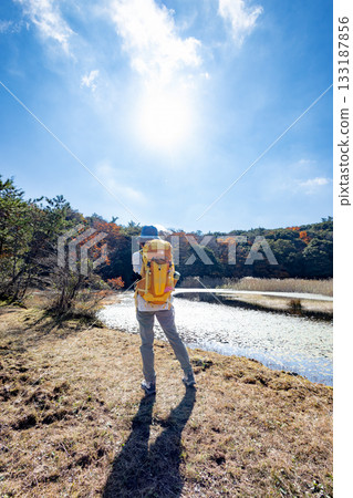 Mountain climbing in autumn 133187856