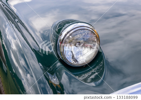 Headlight of the old car 133188099