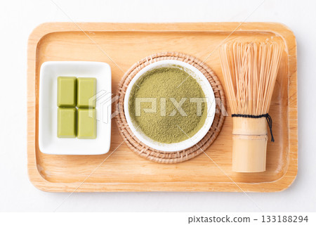 Matcha powder and chocolate bar on white background 133188294