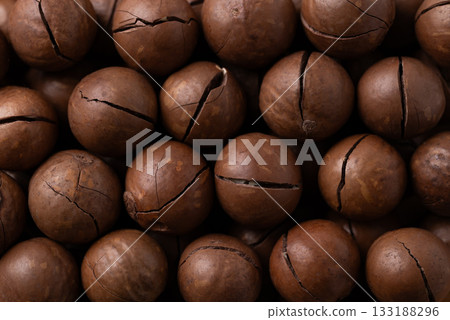 Unpeeled Macadamia nuts texture background Unpeeled Macadamia nuts texture background 133188296