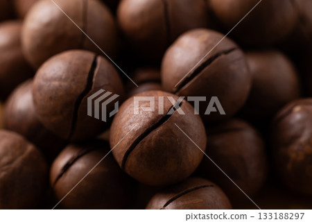 Unpeeled Macadamia nuts texture background Unpeeled Macadamia nuts texture background 133188297