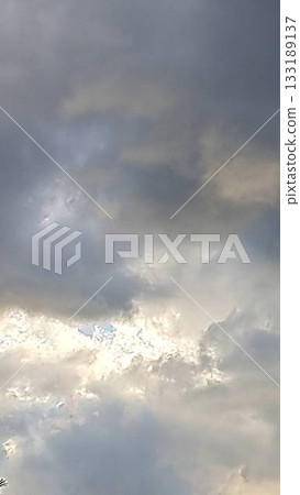 Light seen through the gap between clouds Light seen through the gap between clouds 133189137
