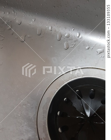 Dirt in the sink, water droplets, water droplets in the sink Dirt in the sink, water droplets, water droplets in the sink 133189355