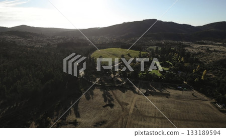 Aerial view flying over a vast rural landscape 133189594