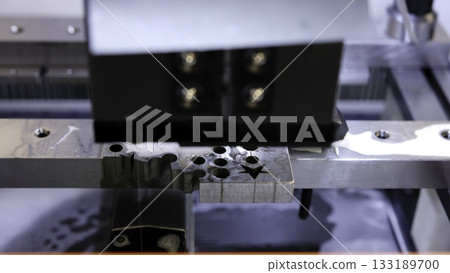Electrical discharge machining creating metal part. Media Electrical discharge machining creating metal part. Media 133189700