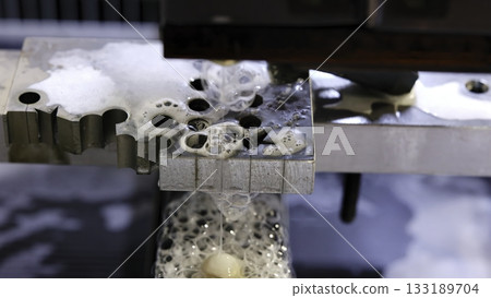 Industrial water jet cutting metal, montage sequence. Media 133189704