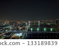 Night view of Rainbow Bridge spanning the city 133189839