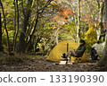 A man enjoying solo camping in autumn 133190390