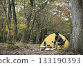 A man enjoying solo camping in autumn 133190393