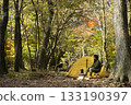 A man enjoying solo camping in autumn 133190397
