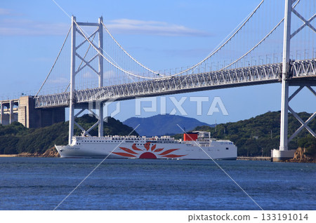 A ship passing through Seto Ohashi Bridge 133191014