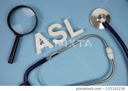 ALS Amyotrophic Lateral Sclerosis text with Stethoscope and magnifying glass on blue background 133191236