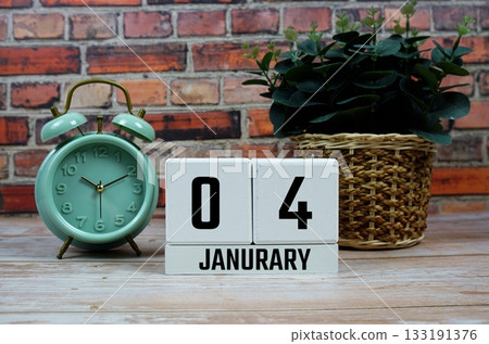 Wooden Calendar Showing the Date of January 4th. Day 4 of January month Wooden Calendar Showing the Date of January 4th. Day 4 of January month 133191376