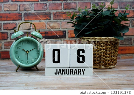 Wooden Calendar Showing the Date of January 6th. Day 6 of January month 133191378