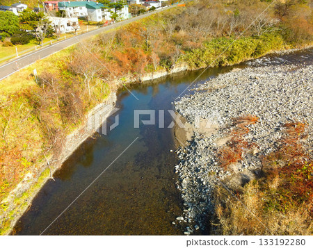 Aerial view of the scenery near the mouth of the Ainuma River in Kumaishi, Yakumo Town, Hokkaido in late autumn 133192280