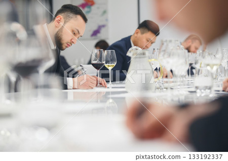 Sommelier passes training for get the certification. Wine waiter school, winemaking lecture. Blind wine tasting. Sommelier passes training for get the certification. Wine waiter school, winemaking lecture. Blind wine tasting. 133192337