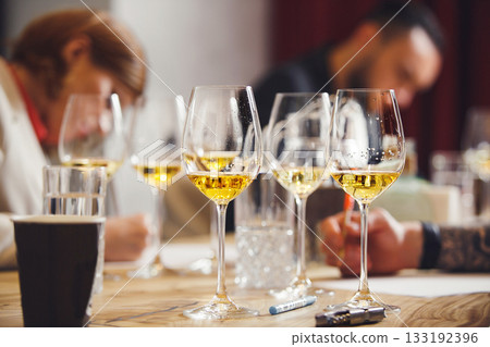 Blind wine tasting, Sommelier passes training for get the certification. Wine waiter school, winemaking lecture. Blind wine tasting, Sommelier passes training for get the certification. Wine waiter school, winemaking lecture. 133192396